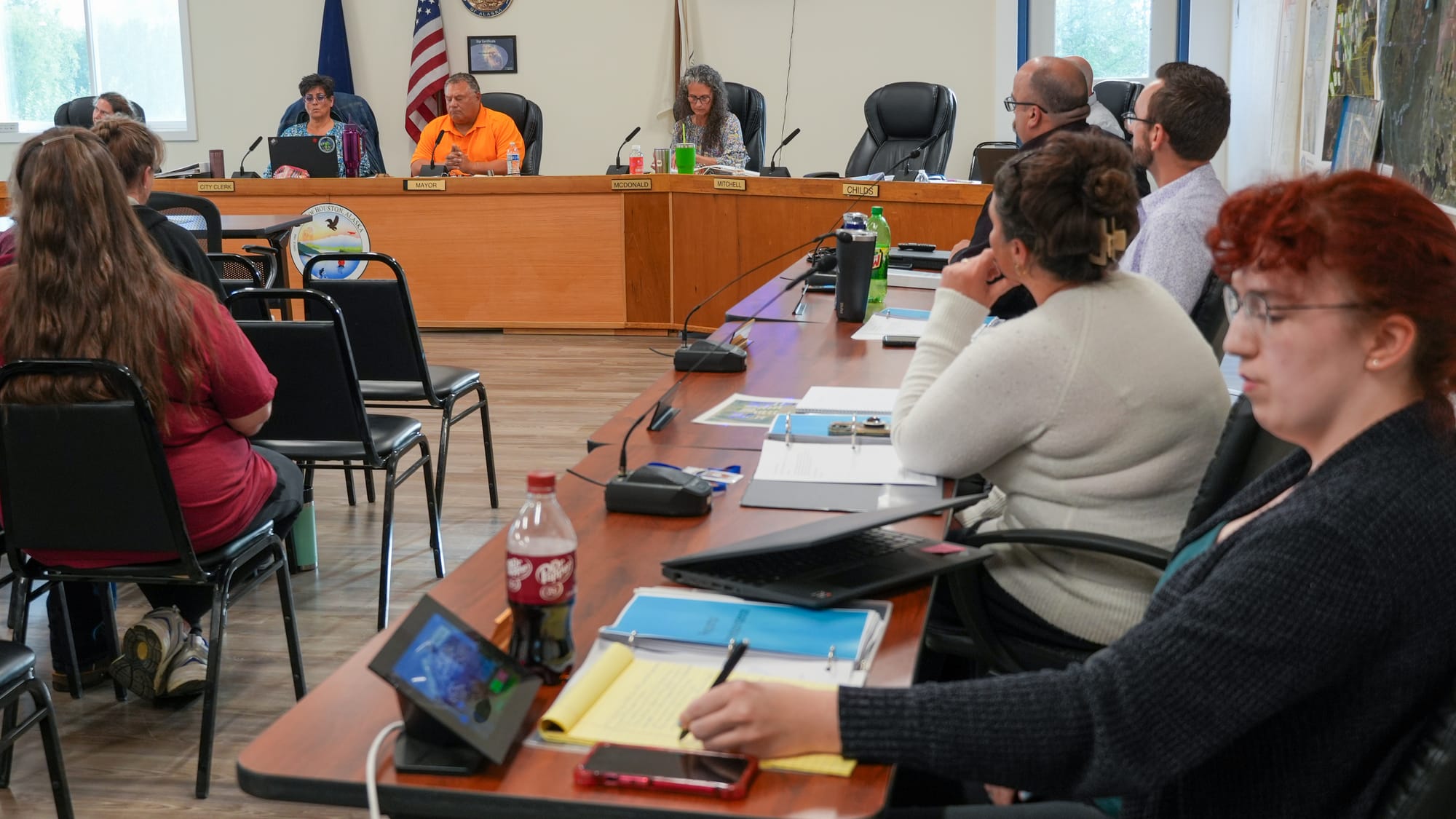 Houston city employees listen to a discussion 