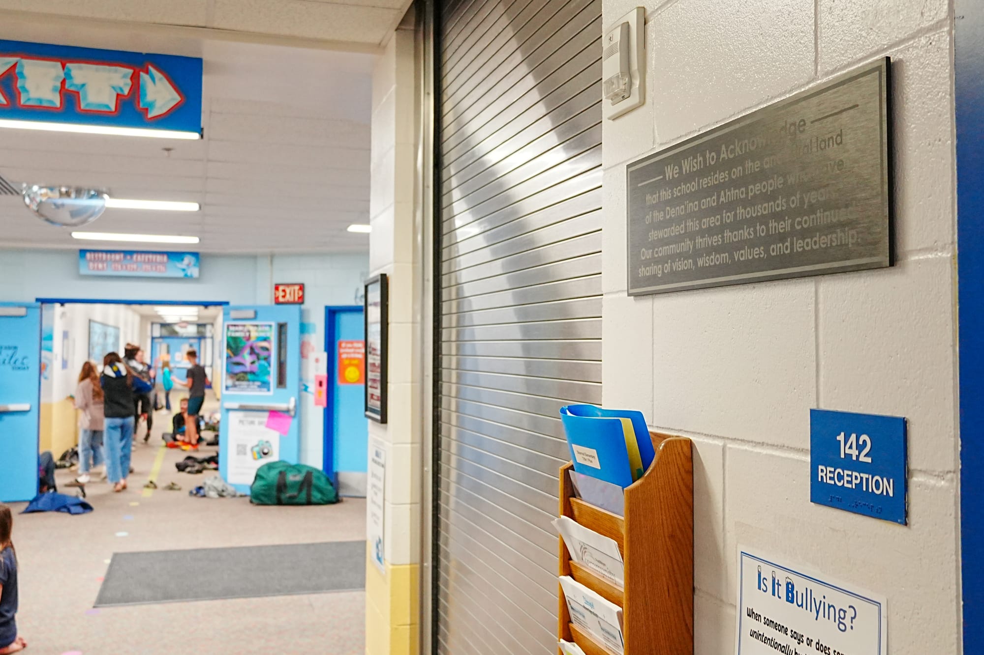 A land acknowledgment sign is displayed in Sherrod Elementary school