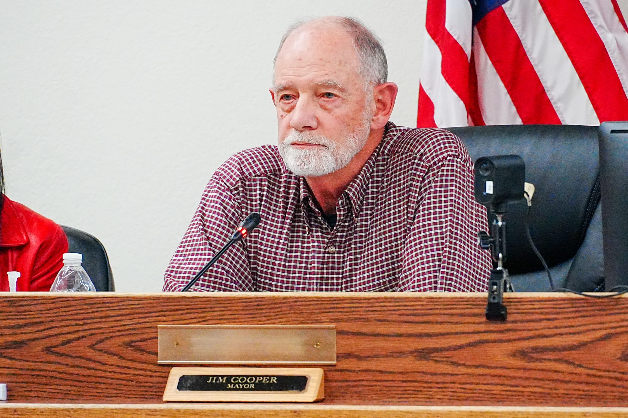 Palmer Mayor Jim Cooper listens to public testimony