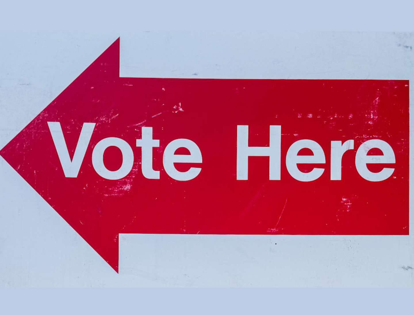 Vote here sign