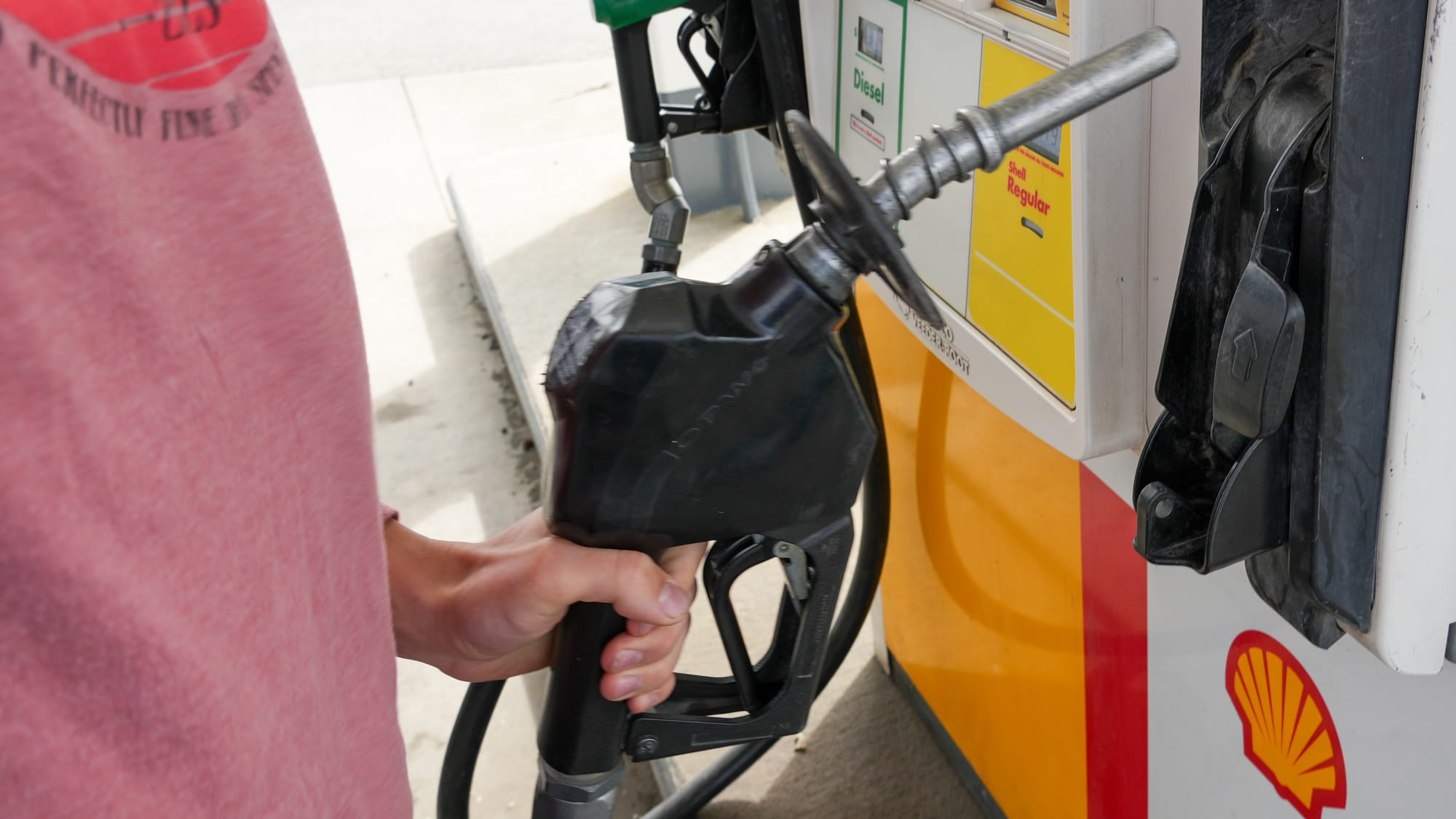 A borough resident puts gas in their vehicle at a Shell station outside Three Bears