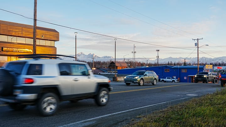 Rush hour traffic moves along Main Street in Wasilla