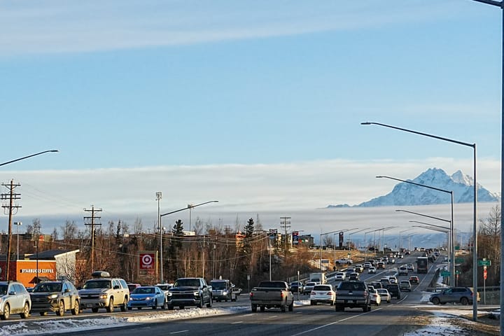 Vehicles travel along the Parks Highway near