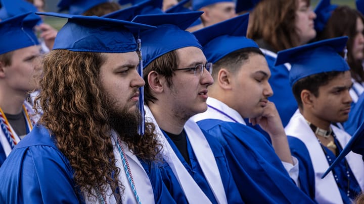 Students listen during a 2025 Palmer High School Graduation ceremony