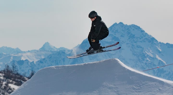 A skier jumps in the terrain park at Skeetawk in Hatcher Pass